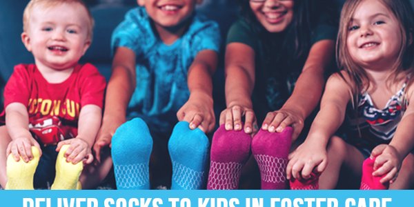 four kids wearing socks