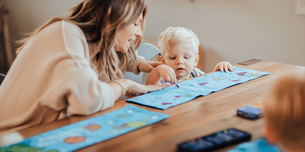 woman and toddler in preschool