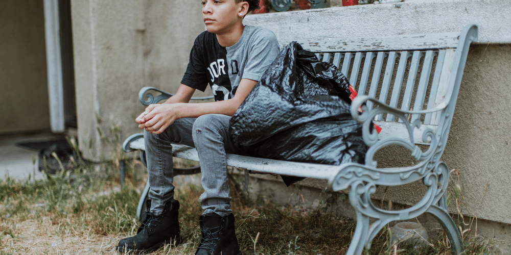 boy teen sitting on the bench