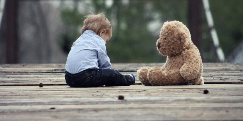 little boy and teddy bear