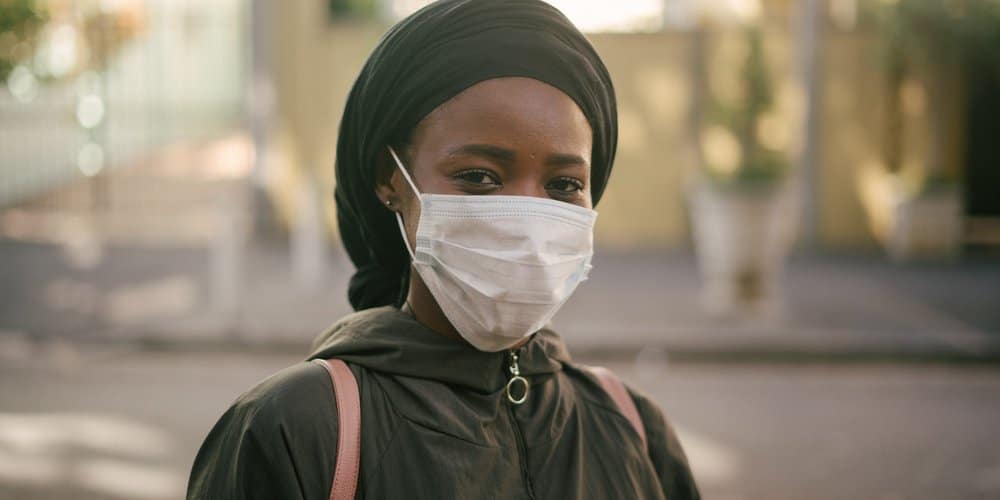 African-American woman in face mask