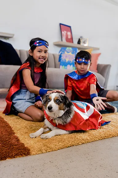 boy girl dog as superhero