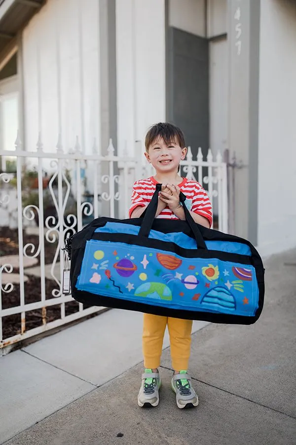 boy holding sweet case