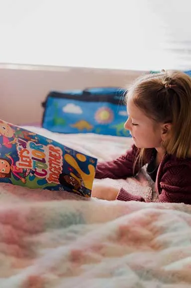 girl coloring in sweet case