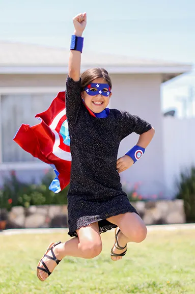 girl dresed as superhero