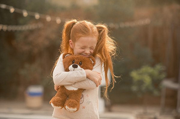 Girl Hugging Bear