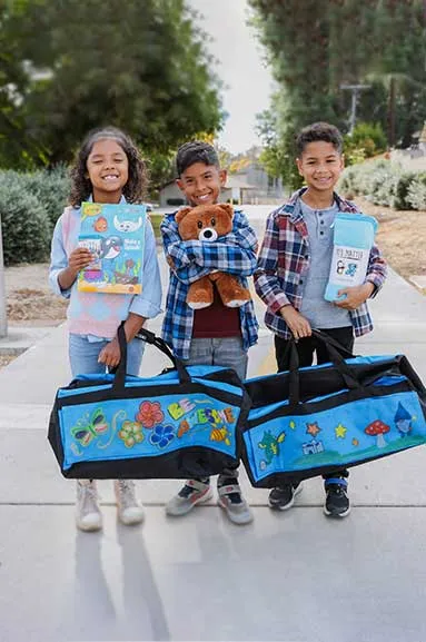 group of kids with sweet case