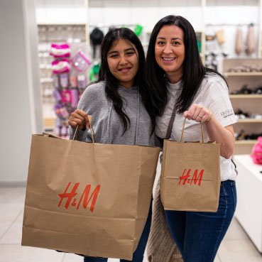 2 girls posing after shopping