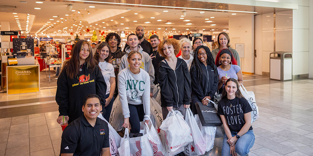 students from the foster love Macy's Shopping Spree