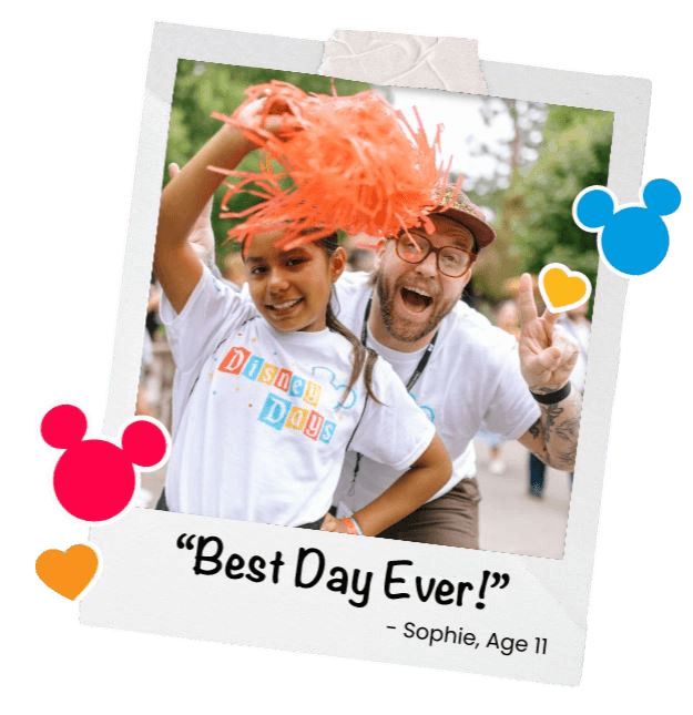 A Disney Day volunteer with a child at Disneyland