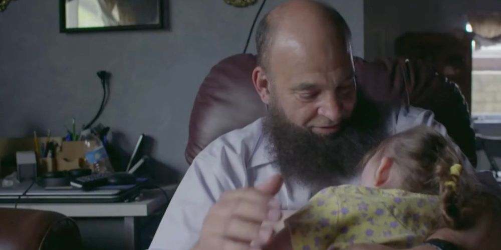 Mohamed Bzeek, a foster parent for terminally ill children, and his daughter