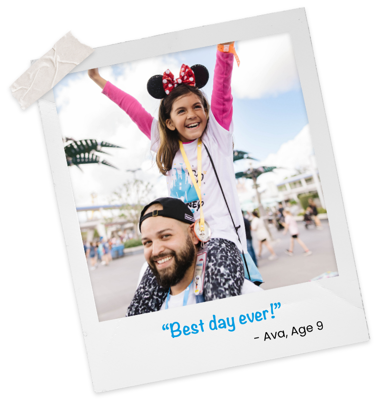 A volunteer and child at the Disney Days sibling reunification event.