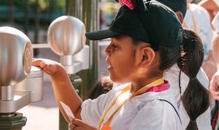 Foster child scanning magic band at Disney Days