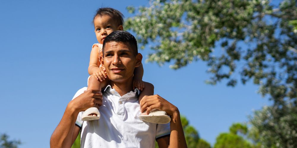 Father and son on shoulders