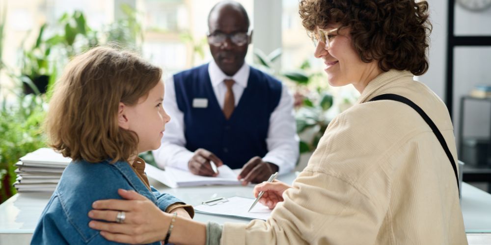 child protective services sitting with child in an office