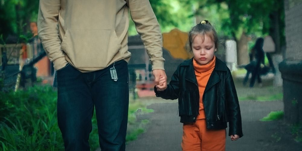 girl being led away because a foster placement is not working out