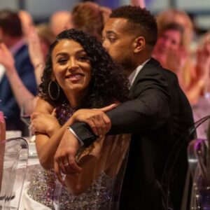 couple embracing at the foster love gala