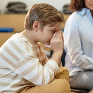 boy getting upset during counseling