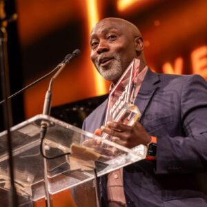 Foster Dad Flipper accepting award