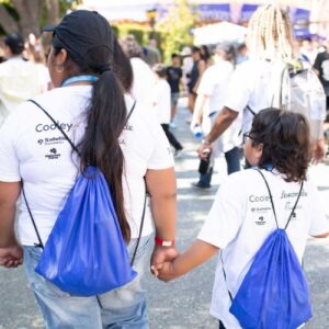 Siblings holding hands at Disneyland