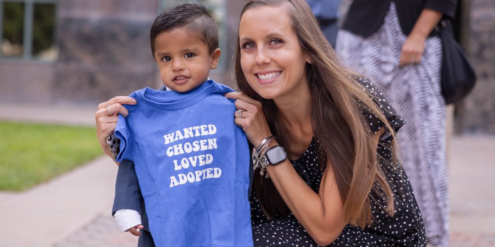 A family celebrating National Adoption Month