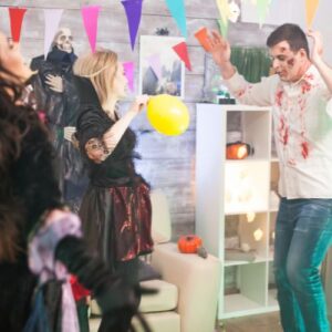 Coworkers dancing at a halloween office party