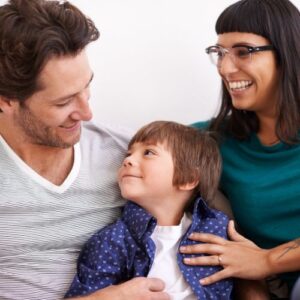 Child smiling at his parents