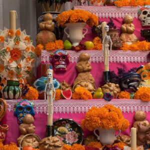 A vibrant, decorated ofrenda for dia de los muertos