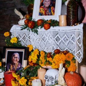 An ofrenda with pictures