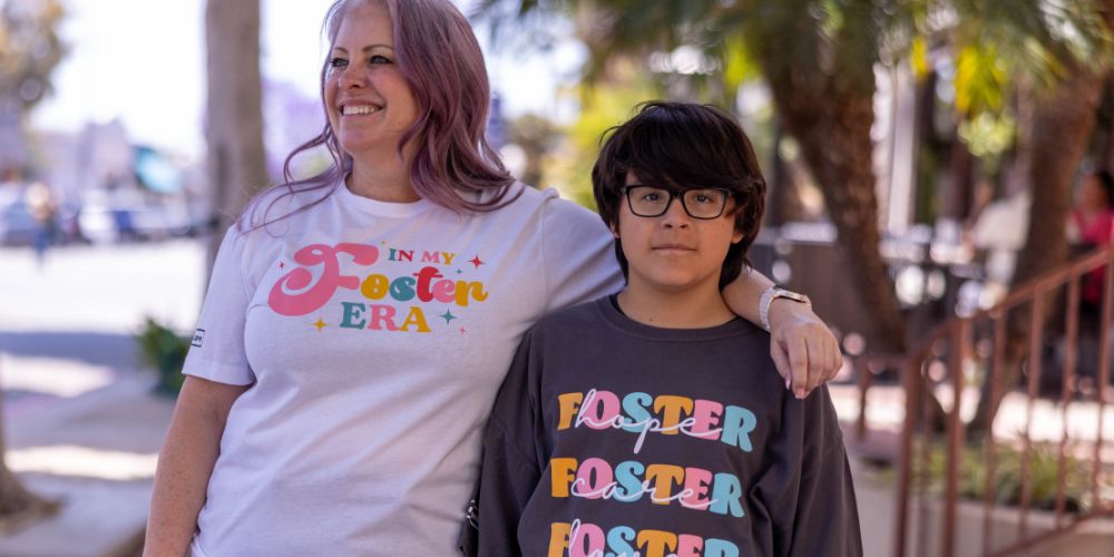a mom and son with foster pride