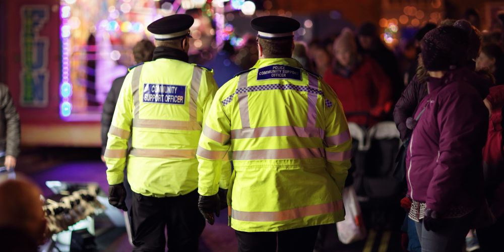 Police in a crowd on christmas