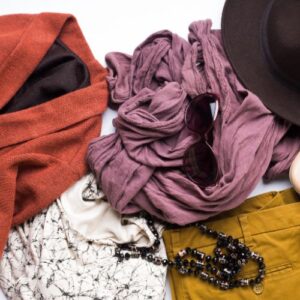 A pile of clothes and other things to buy for a foster child