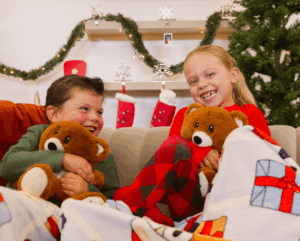 Kids with toys on Christmas morning