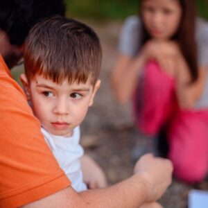 boy ignoring his parents