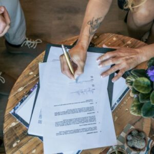 Signing adoption papers