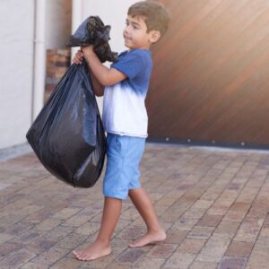 boy with a trash bag