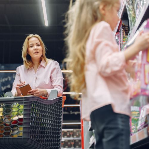 woman shopping with daughter