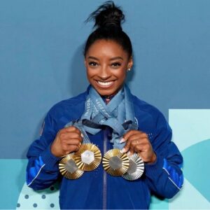 simone biles holding medals