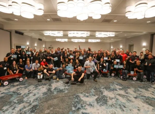 Gallery_2 Volunteers in a ballroom after completing a team building activity