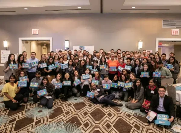 Gallery_4 Large team posing with Boxes they decorated and assembled with Foster Love
