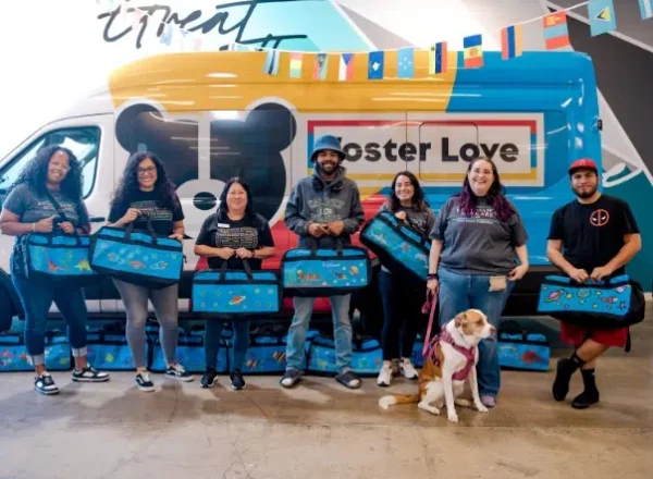 Gallery_5 5 people and a dog showing off Sweet Cases they decorated