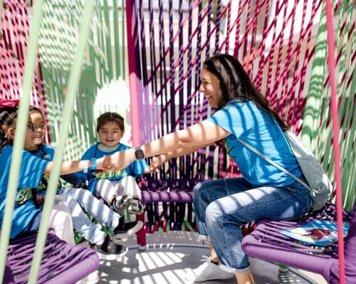 a volunteer at birthday palooza kidspace