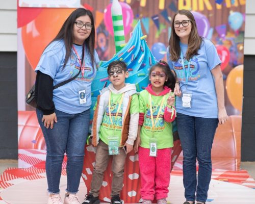 two volunteers at birthday palooza